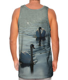 Two Swans Swim